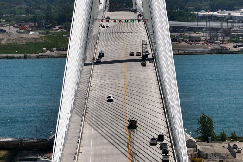 The pedestrian and bicycling path for the Gordie Howe International Bridge is seen on the left or upriver side of the bridge in this aerial photo captured on June 8 on the Detroit side the new international crossing.