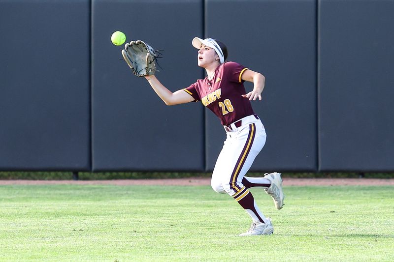 Farmington Hills Mercy's Sophia Chaput catches the ball for an out during the Division 2 softball state semifinal on Thursday, June 11, 2026, at Secchia Stadium in East Lansing.
