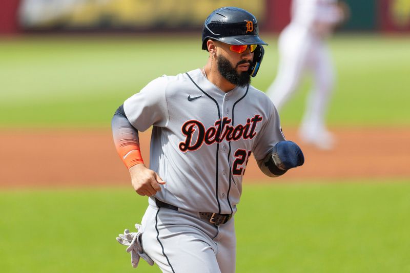 Tigers second baseman Gleyber Torres crosses home plate to score the first run of the game against the Guardians during the first inning.