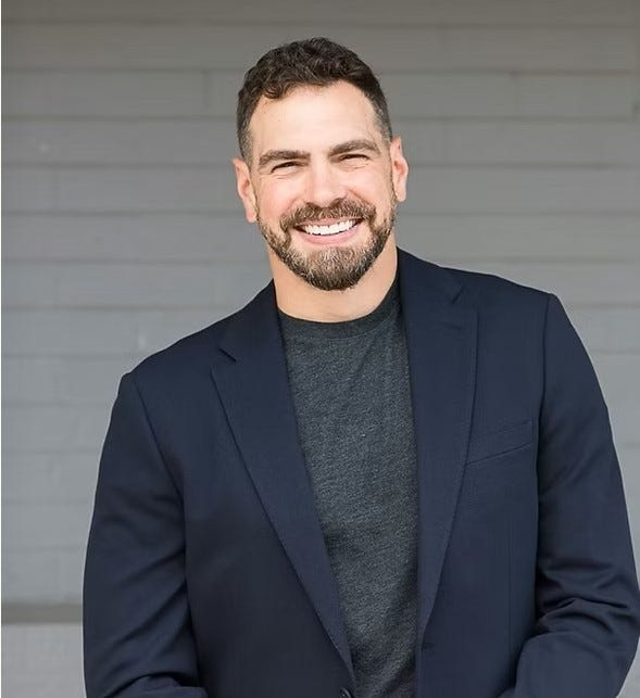 Kyle Blomquist is an Iron Mountain architect who casts himself as a warrior for the working class, a self-avowed Democratic Socialist who says, “too often our government empowers a wealthy few to exploit the many.”