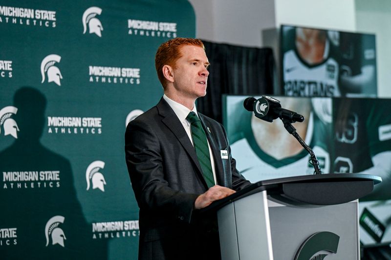 Jon Palumbo, MSU executive deputy athletic director/chief operating officer and Spartan Ventures CEO, speaks during an announcement of Michigan State Athletics and MSUFCU’s jersey patch sponsorship on Monday, June 15, 2026, at the MSUFCU Club in Spartan Stadium in East Lansing.