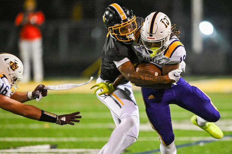 Detroit King's Don Spillers (left) verbally committed to Michigan State football on Monday.