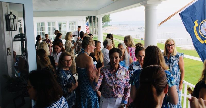An Impact100 Little Traverse Bay summer social gathering.