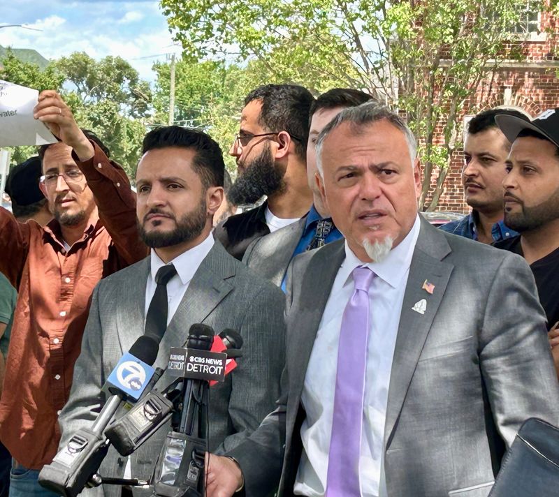 Hamtramck Mayor Adam Alharbi, left, and his attorney Nabih Ayad explain at a press conference outside city hall why Alharbi is asking a Wayne County judge to overturn the City Council's decision last week to fire the city manager on Monday, June 15, 2026.