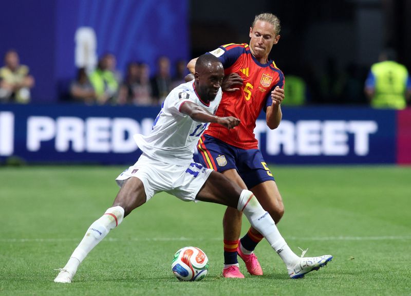 Cape Verde's Willy Semedo, left, battles for possession with Spain's Marcos Llorente in Monday's World Cup match.