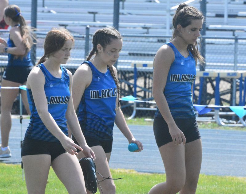 From left, Inland Lakes' Faith Lehre, Kaylee Taglauer and Chloe Robinson each earned nods on the Cheboygan Daily Tribune's 2026 all-area girls track and field team.