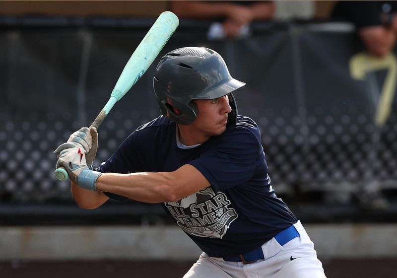 New Boston Huron's Noah Banas hits during the Monroe County vs. Lenawee County Baseball All-Star Game at Adrian College on Monday, June 15, 2026.