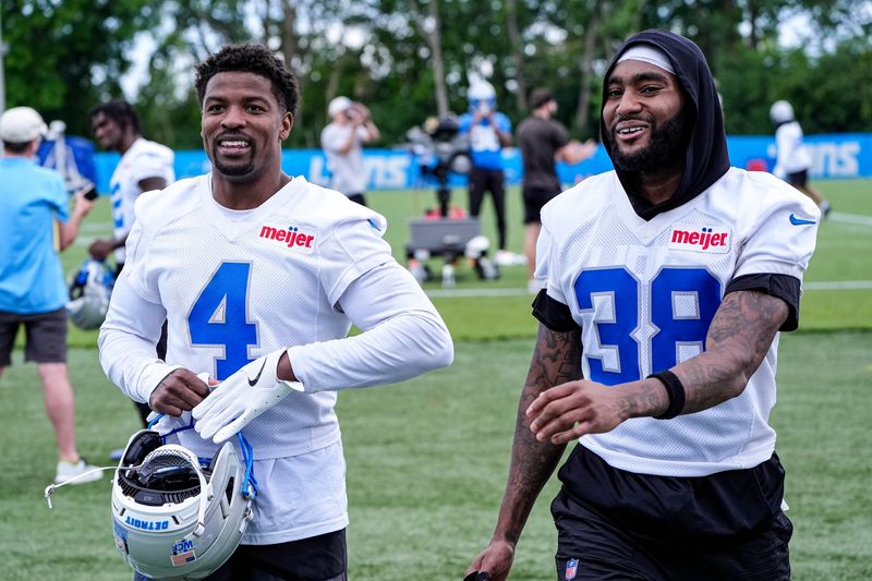 Detroit Lions cornerback D.J. Reed (4), left, talks to defensive back Nick Whiteside (38) after practice during mini camp at Meijer Performance Center in Allen Park on Tuesday, June 16, 2026.