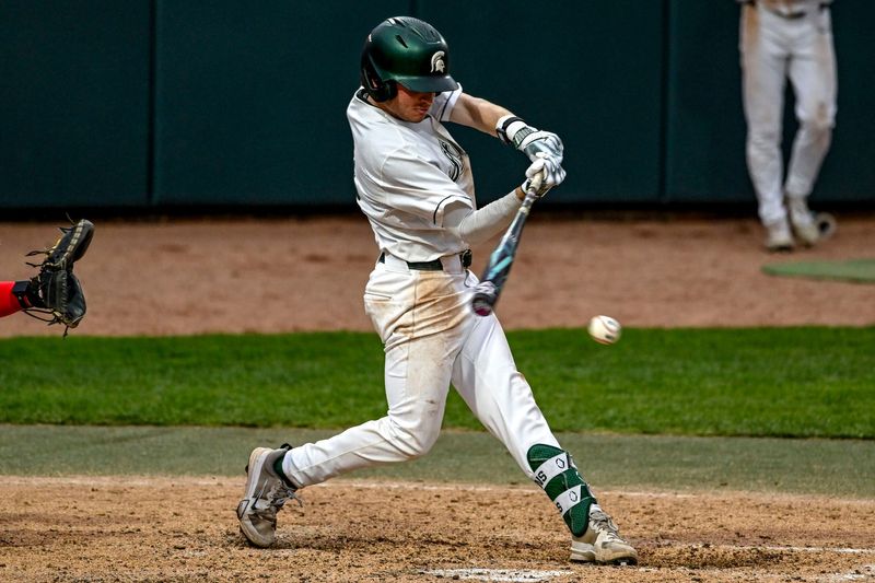 Michigan State's Dayton Murphy drives in a run against Ohio State during the eighth inning on Friday, April 18, 2025, at McLane Stadium in East Lansing.