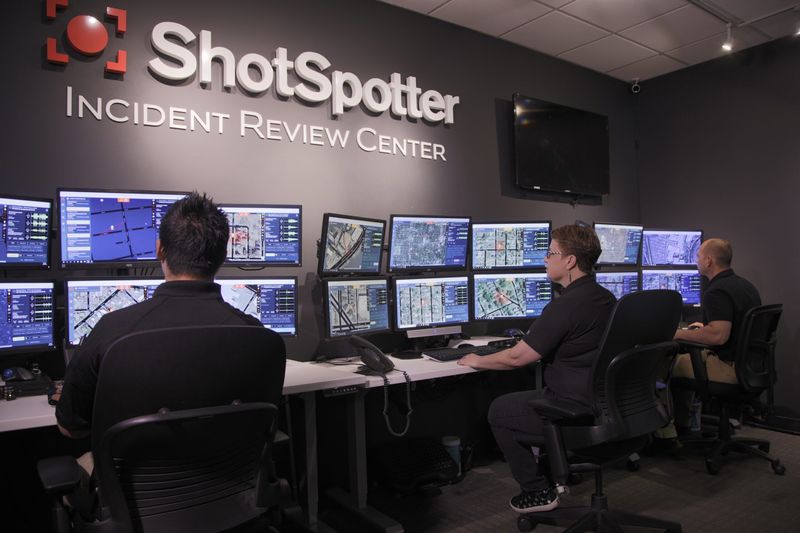 Analysts in ShotSpotter's Incident Review Center check the audio signature of detected sounds to determine whether they are likely gunshots. The company has two review centers, one in Fremont, California, and one in Washington, D.C. The Detroit City Council is considering an extension of the ShotSpotter contract, but a council committee recommended rejecting the extension.