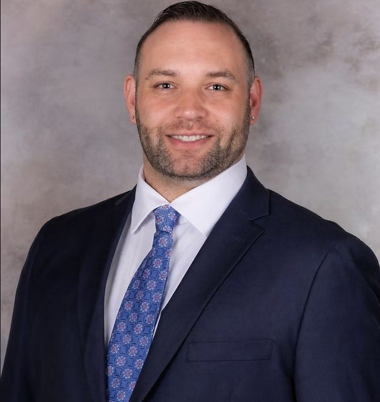 Ryan Cushman is a Michigan National Guard veteran and now owns a health care billing agency. He would make driving down the cost of health care his mission in Congress.