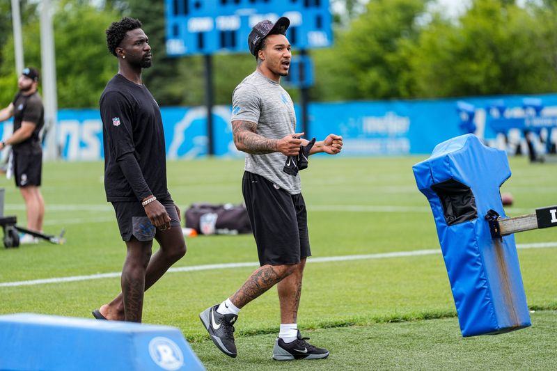 Detroit Lions safety Kerby Joseph (31), left, and safety Brian Branch (32) walk off the field after practice during mini camp at Meijer Performance Center in Allen Park on Wednesday, June 17, 2026.