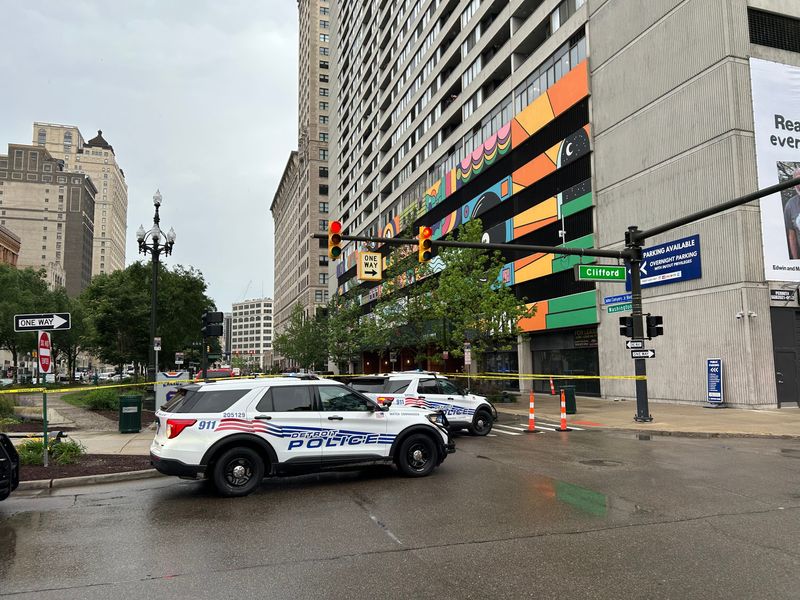 Detroit police respond to a downtown high-rise on Washington Boulevard near Grand River Avenue, where a person appears to have died in a plunge from the building on Wednesday, June 17.