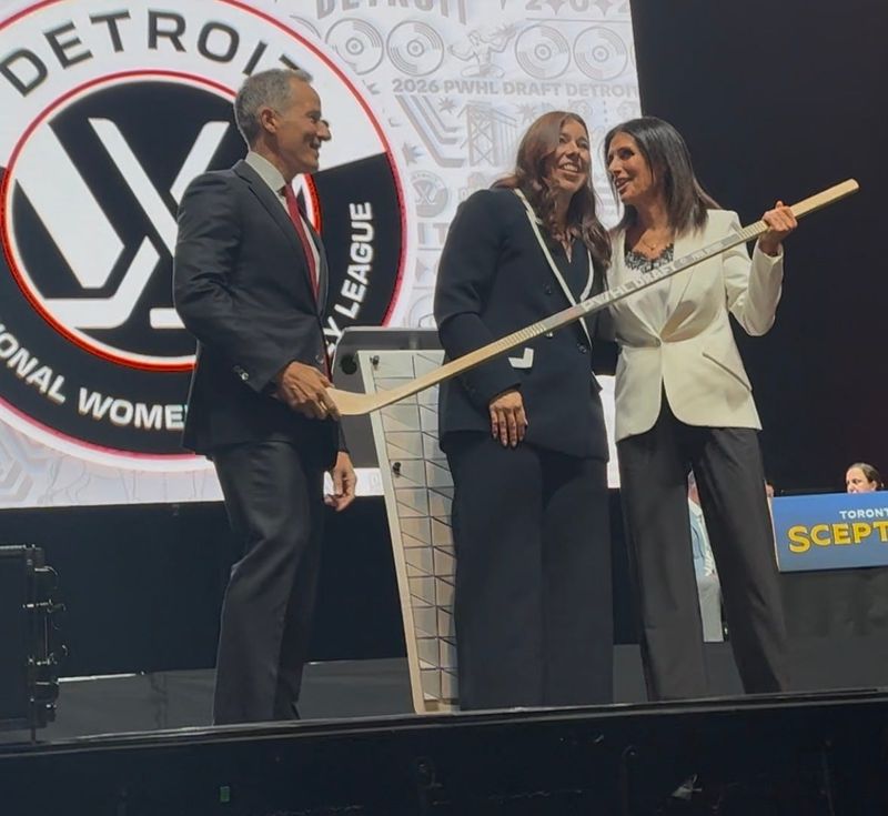 Chris Ilitch, president and  CEOof Ilitch Holdings, Detroit PWHL top draft pick Andrea Brändli and Detroit GM Manon Rheaume at the PWHL draft on June 17, 2026 in Detroit.