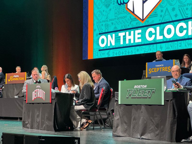 Detroit PWHL general manager Manon Rheaume (center left) sits with, left to right, former Wings goaltender Jimmy Howard (a Detroit PWHL consultant), Detroit coach Jon Sciba and consultant Ellen Hughes at the 2026 PWHL draft on June 17, 2026 in Detroit.