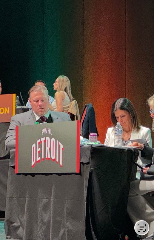 Former Detroit Red Wings goaltender Jimmy Howard sits with Detroit PWHL GM Manon Rheaume on stage at the Fox Theater in Detroit at the 2026 PWHL Draft on Wednesday, June 17, 2026.