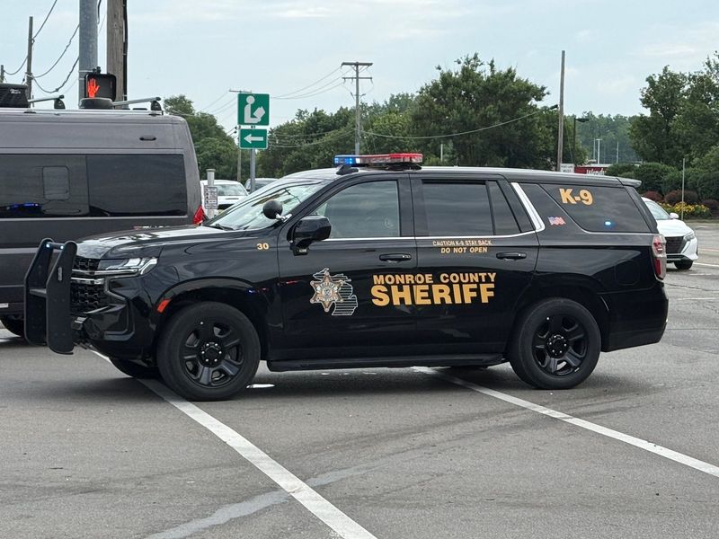 A Monroe County Sheriff's Office vehicle helps direct traffic.
