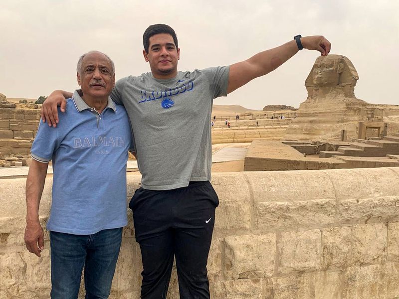 Ahmed Hassanein, right, shown here in an undated photo, hopes father Hassanein Mahdy Hassanein, left, will be able to watch him play for the Detroit Lions in person this season.