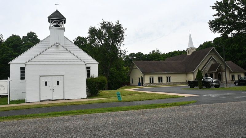 The original reservation Indiana Church is flanked by the new one built on the Pine Creek reservation.