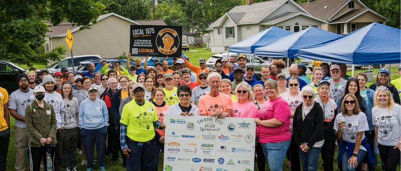 Volunteers gather before Blue Water Habitat for Humanity's Rock the Block event on June 20, 2026, near Audrey Pack Park in Port Huron.