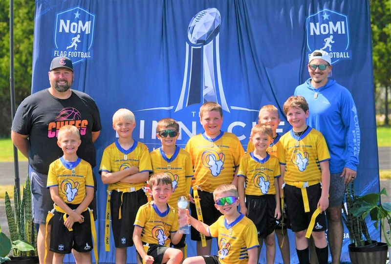 The Rams, which featured Cheboygan players, went undefeated in the NoMI Flag Football League, finishing a perfect 9-0 in the Junior Pinnacle Division (7-9 years old). Members of the team include (first row, from left), Drake Wilson, Emmett Gahn-Pearson, (second row, from left) coach Ben Schley, Ceagan Wolf, Connor Fimbinger, Gage Chapman, Elliott Schley, Jax Gaynor, Elijah Dombroski, Oscar Miller and coach Scott Dombroski.