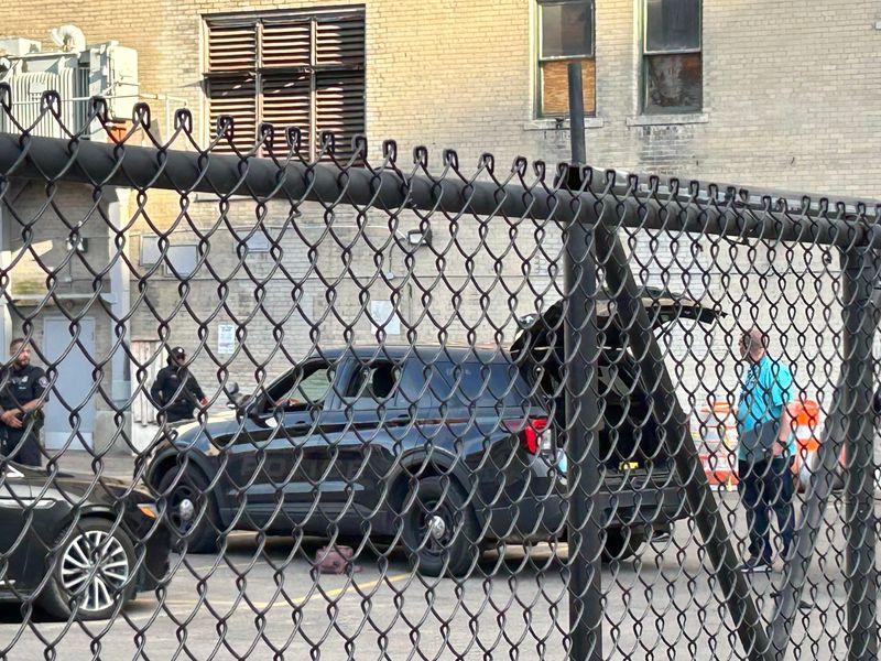 Detroit police gathered Monday evening in a parking lot near Farmer and Bates streets in downtown Detroit.