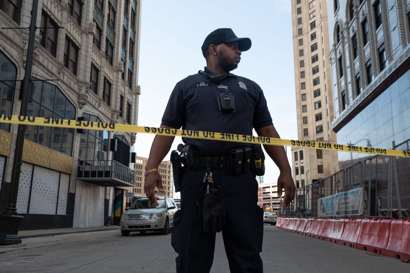 Detroit police officers on scene of a police officer shooting near Bates and Cadillac Square in downtown Detroit before the start of the 68th annual Ford Fireworks at Hart Plaza in downtown Detroit on Monday, June 22, 2026.