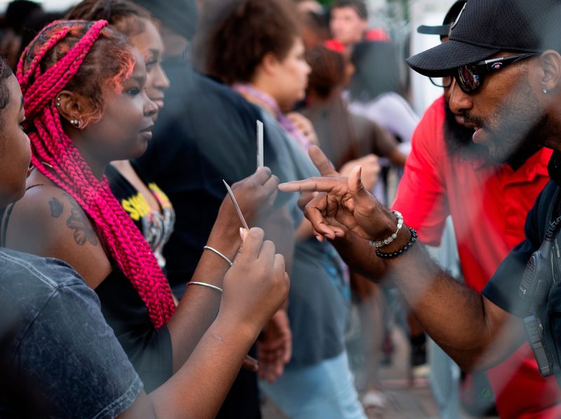 Detroit police and security check identifications of those entering Hart Plaza to make sure they are 18 or with a parent or guardian before the start of the 68th annual Ford Fireworks at Hart Plaza in downtown Detroit on Monday, June 22, 2026.