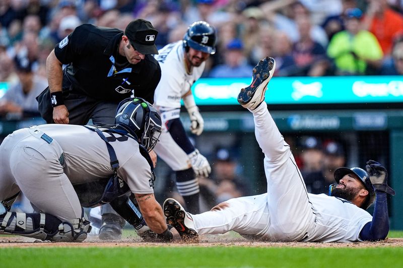 Detroit Tigers left fielder Riley Greene (31) is thrown out at home by New York Yankees catcher Austin Wells (28) during the fourth inning at Comerica Park in Detroit on Tuesday, June 23, 2026.