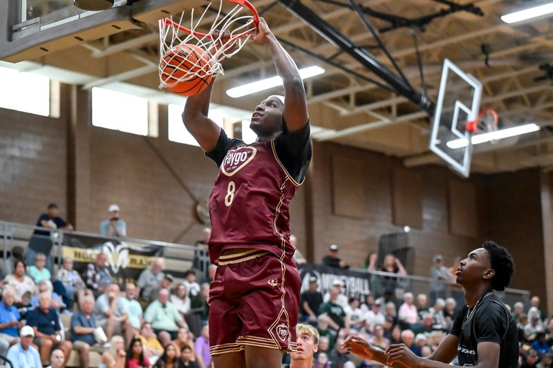 Team Faygo and Michigan State's Cam Ward ducks against Team Motorcars during the Moneyball Pro-Am on Tuesday, June 23, 2026, at Holt High School.