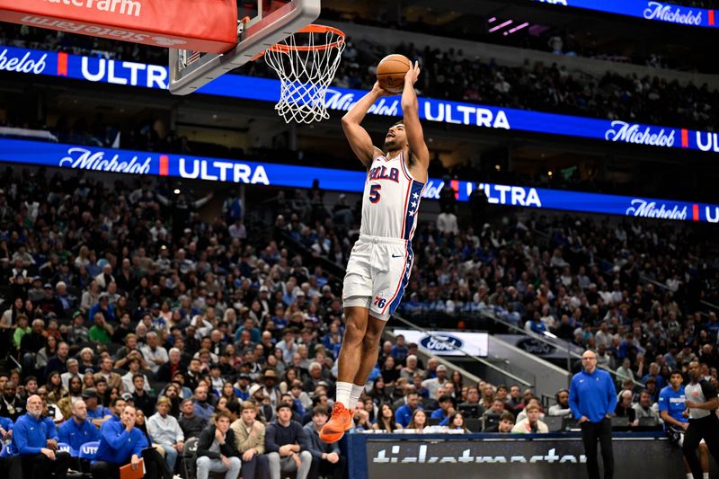 Philadelphia 76ers guard Quentin Grimes (5) dunks the ball during the game between the Mavericks and the 76ers Jan 1, 2026 at American Airlines Center.