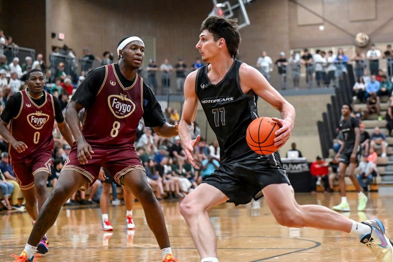 Team Motorcars and Michigan State's Anton Bonke, right, moves the ball as his MSU teammate and Team Faygoâ€™s Cam Ward defends during the Moneyball Pro-Am on Tuesday, June 23, 2026, at Holt High School.