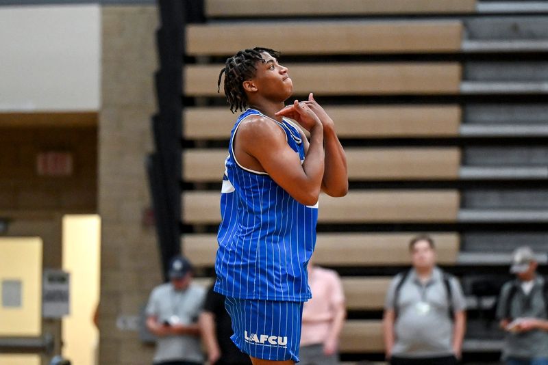 Team LAFCU and Michigan State's Jeremy Fears celebrates after a 3-pointer against Team Tri-Star during the Moneyball Pro-Am on Tuesday, June 23, 2026, at Holt High School.