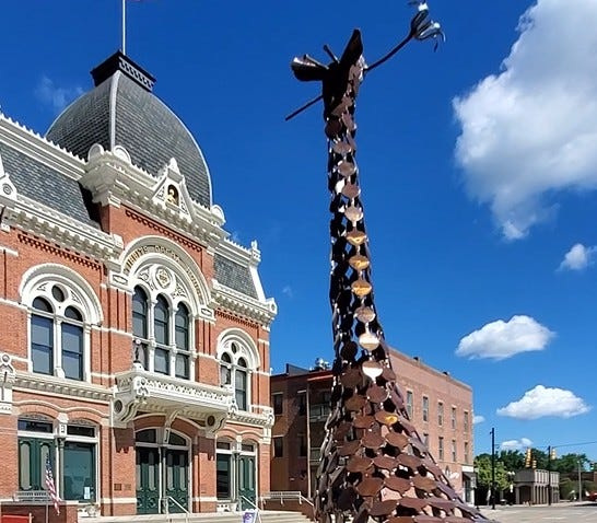 Sunday Mahaja's recycled steel sculpture sits across from the Tibbits Opera House in downtown Coldwater.