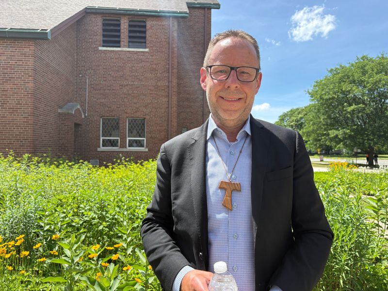 St. Suzanne – Our Lady Gate of Heaven parishioner Steve Wasko, pictured here by a rain garden on the church property, said there would be as few as three parishes holding weekend Mass on the west side of Detroit and as many as 10 that wouldn't under the archdiocese's draft models.
