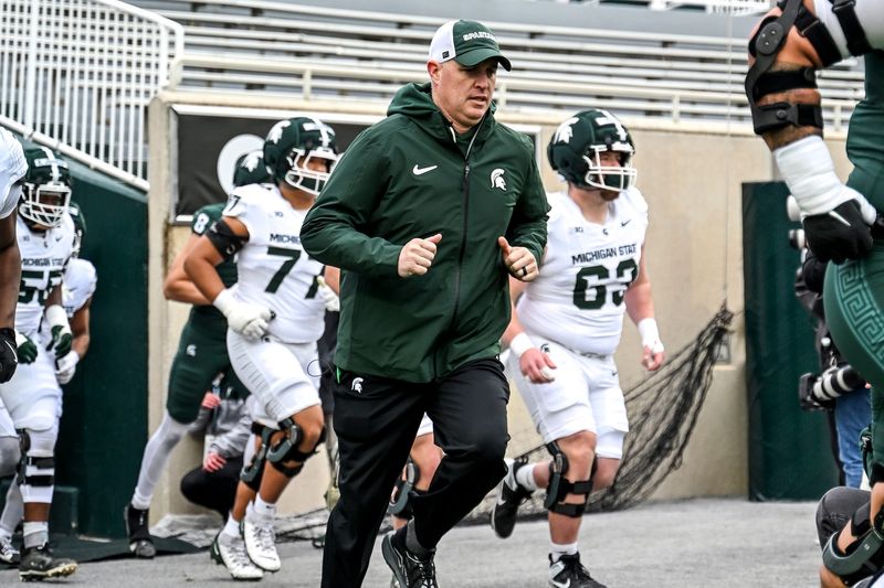 Michigan State's head coach Pat Fitzgerald and the Spartans takes the field during the football Spring Showcase on Saturday, April 18, 2026, at Spartan Stadium in East Lansing.