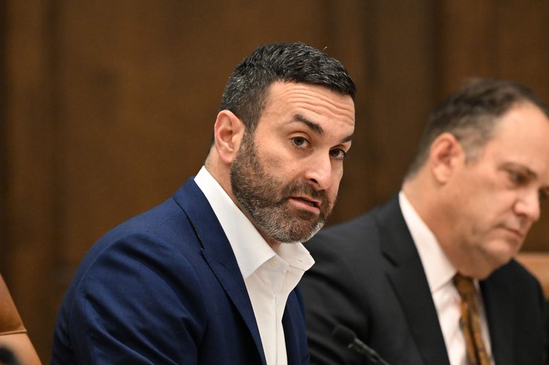 Regent Jordan Acker reads a prepared statement, which included an apology, during a meeting of the University of Michigan Board of Regents on Thursday, June 25, 2026, in Ann Arbor, Michigan.