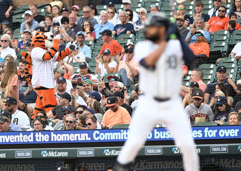 Paws leads the fans in clapping while Tigers’ Riley Greene bats in the first inning. Detroit Tigers take on the Houston Astros on June 25, 2026 at Comerica Park in Detroit.