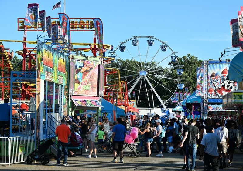 Visitors on the midway at the Livonia Spree, an annual festival that celebrates community spirit and help funds community activities in Livonia,Michigan on June 25, 2026.