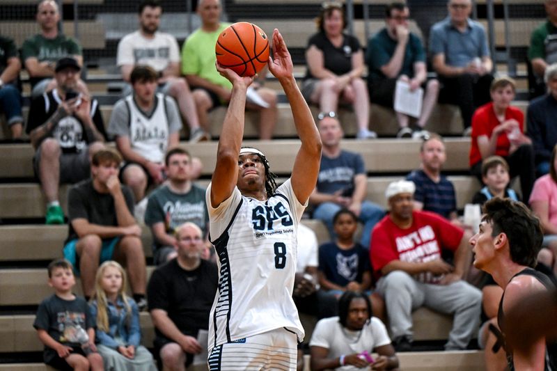 Team SPS and Michigan State's Julius Avent scores against Team Motorcars during the Moneyball Pro-Am on Thursday, June 25, 2026, at Holt High School.