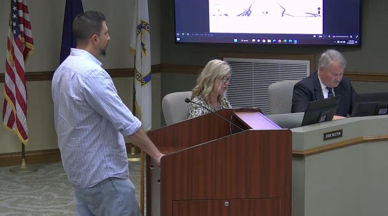 Muhamad Younes of Lambertville addresses the Bedford Township Planning Commission at its June 10 regular meeting. Younes plans to construct an indoor children's playground with cafe in Lambertville.