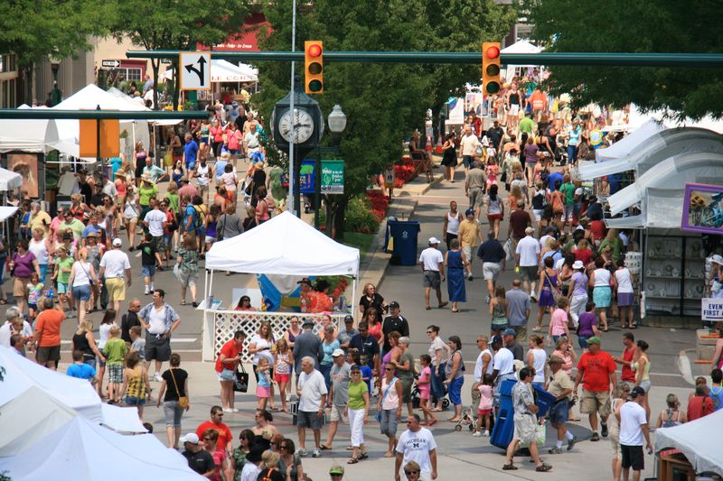 Crowds fill the streets of Downtown Plymouth during the 2025 Art in the Park event.
