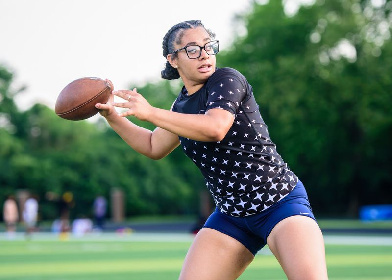 Redford Union's Ameerah Saba passes during the Reaction Technologies Girls Flag Football Showcase and Development Camp on Friday, June 26, 2026, at Birmingham Groves High School.