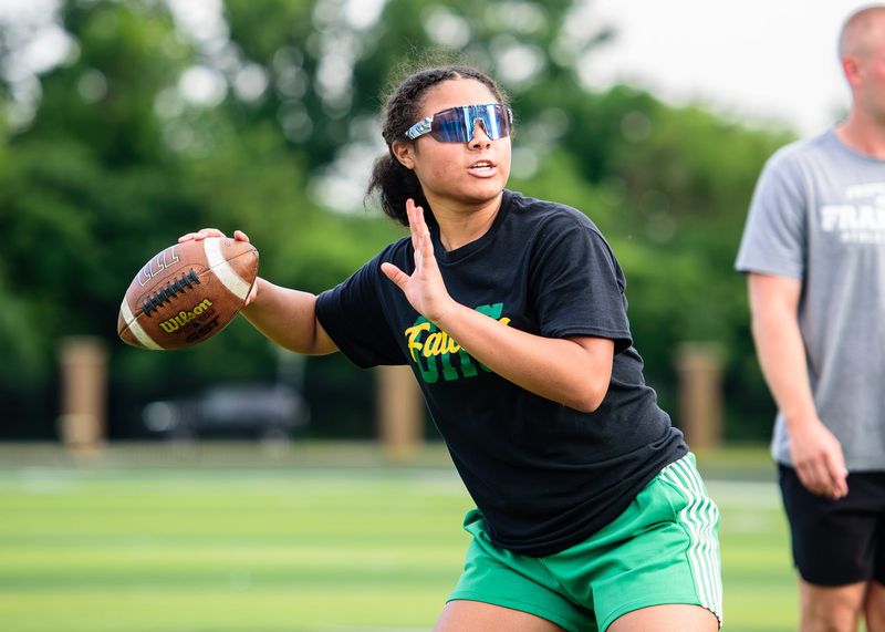 Birmingham Groves' Ke'lko Buskin passes during the Reaction Technologies Girls Flag Football Showcase and Development Camp on Friday, June 26, 2026, at Birmingham Groves High School.