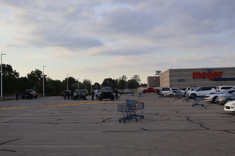 Michigan State Police are investigating after a Southgate Police officer shot a man in the Meijer parking lot in the Downriver community on Saturday afternoon.