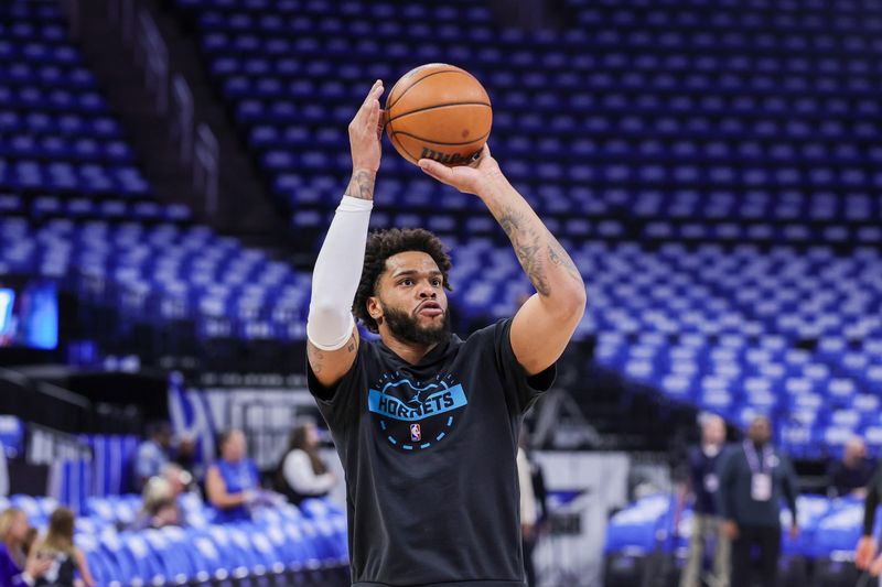 Apr 17, 2026; Orlando, Florida, USA; Charlotte Hornets forward Miles Bridges (0) warms up before the game against the Orlando Magic during the play-in rounds of the 2026 NBA Playoffs at Kia Center. Mandatory Credit: Mike Watters-Imagn Images