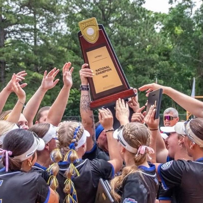 The Madonna softball team celebrates winning its first NAIA national championship.