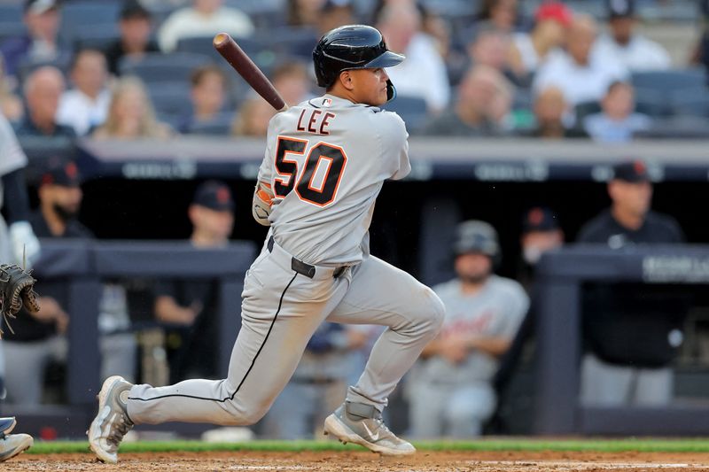 Jun 29, 2026; Bronx, New York, USA; Detroit Tigers second baseman Hao-Yu Lee (50) follows through on a two run single against the New York Yankees during the second inning at Yankee Stadium. Mandatory Credit: Brad Penner-Imagn Images
