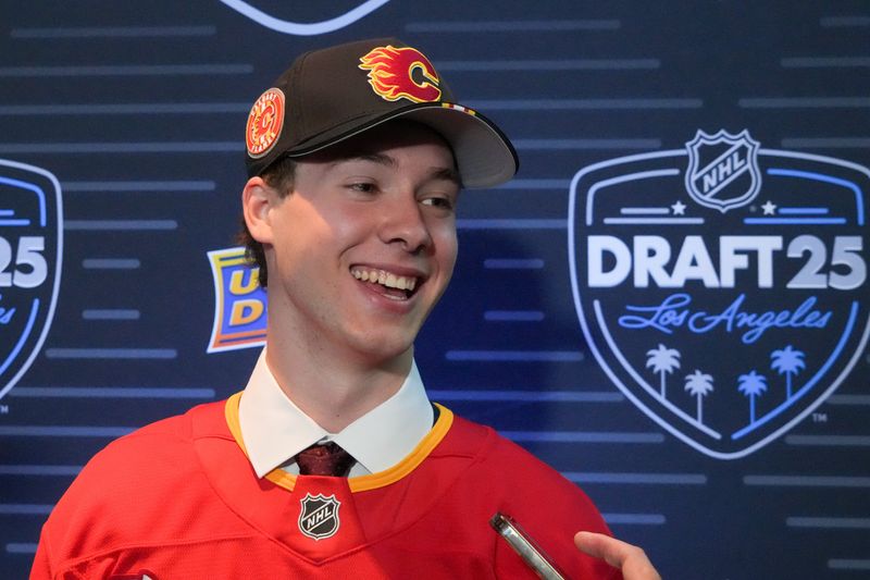 Jun 27, 2025; Los Angeles, California, USA; Cullen Potter is interviewed after being selected as the 32nd overall pick to the Calgary Flames in the first round of the 2025 NHL Draft at Peacock Theater. Mandatory Credit: Kirby Lee-Imagn Images