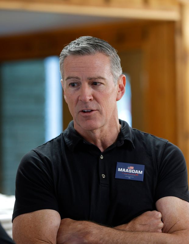 Michigan Democratic 7th District Congressional candidate Matt Maasdam talks with attendees, Thursday, June 25, 2026, during a Shiawassee County Democratic Party event at DeVries Nature Conservancy in Owosso.